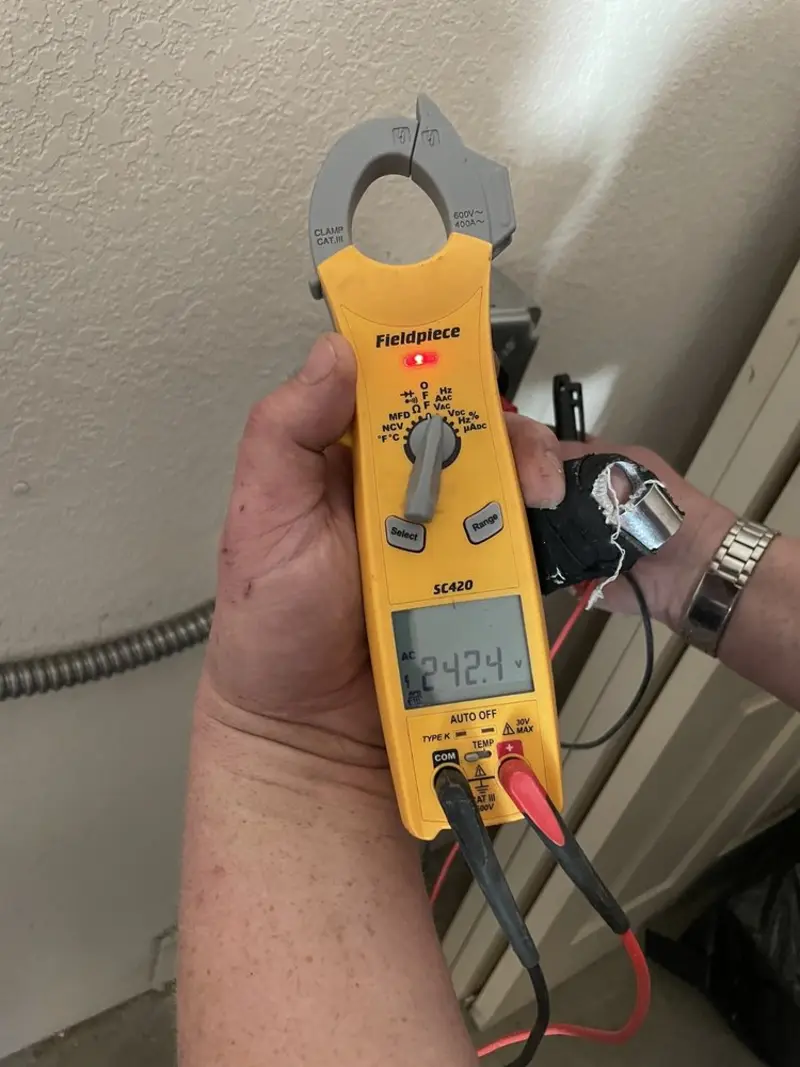 Voltage testing with clamp meter during Aluminum Wiring Replacement in Morehead